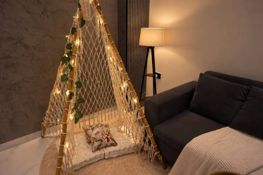 Macrame reading nook with fairy lights